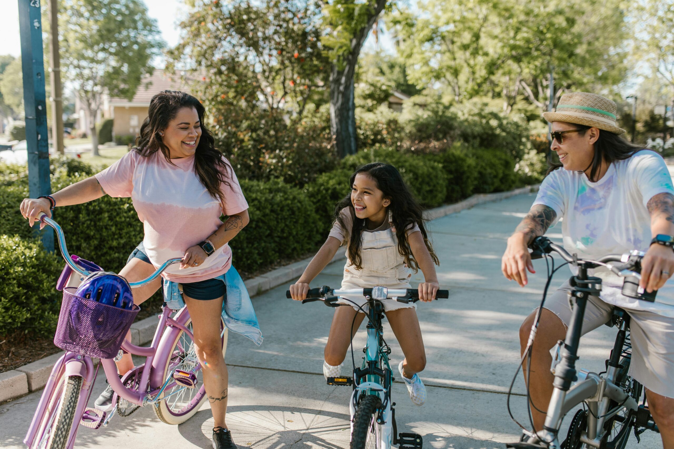 Family with kids riding their bikes