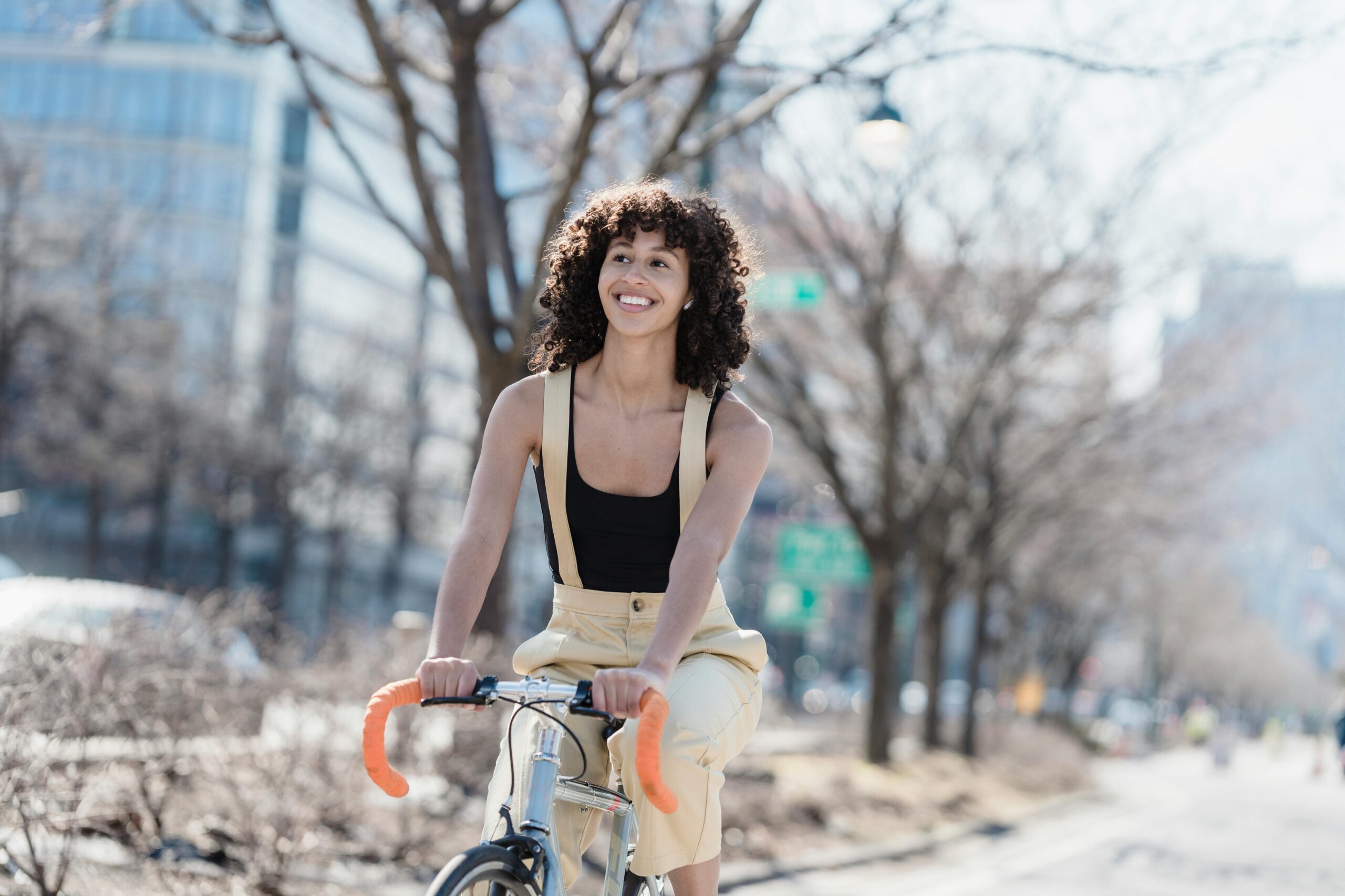 Woman biking in the city.