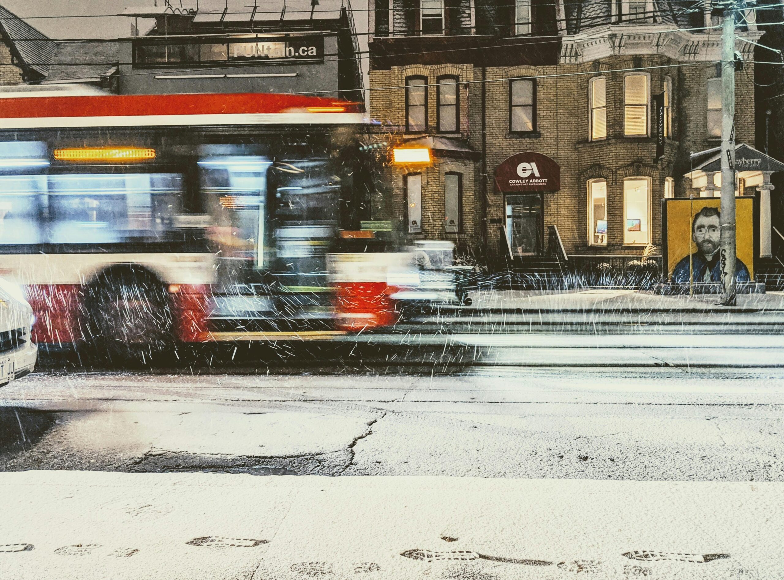 A blurred image of a bus in Toronto