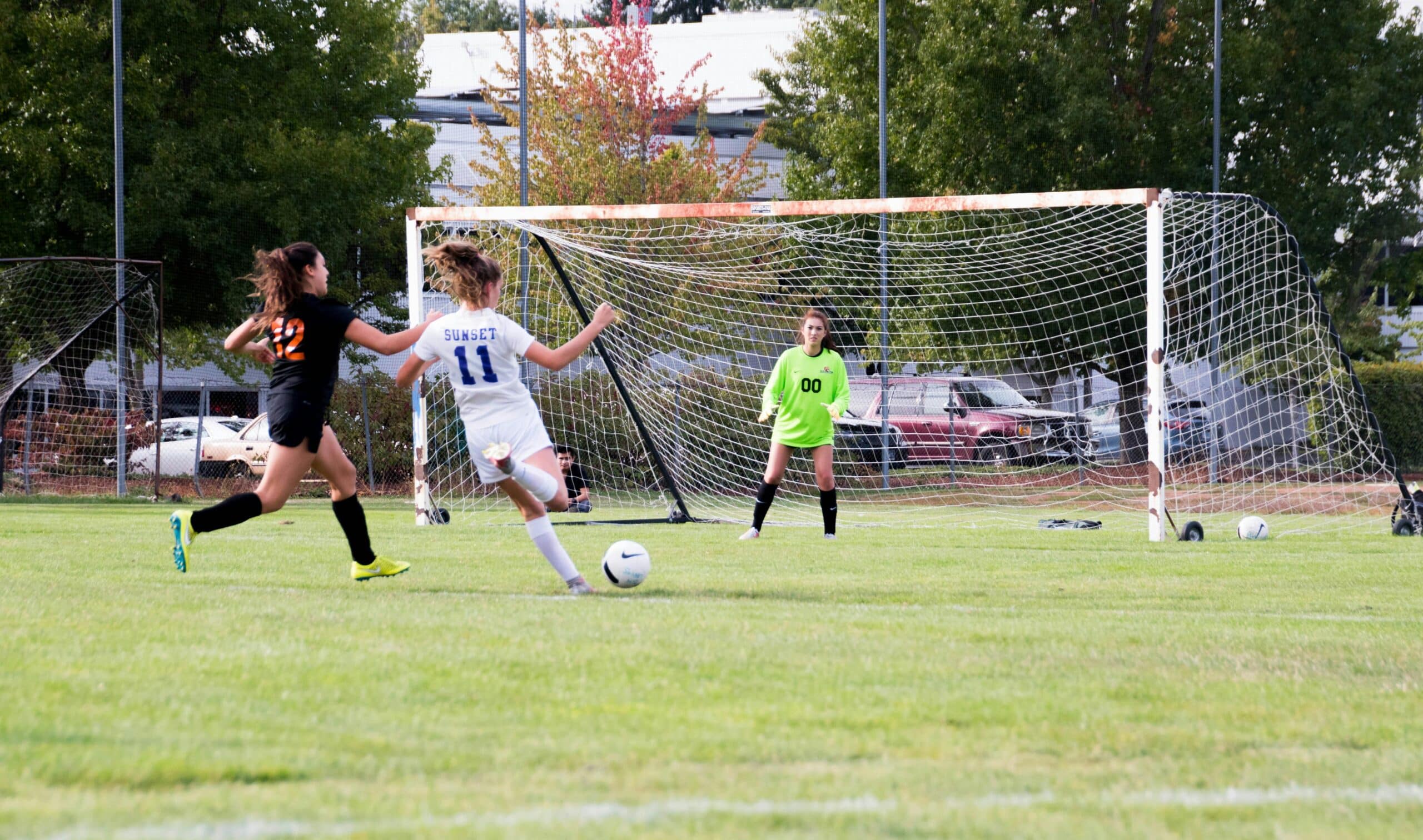 women playing soccer.